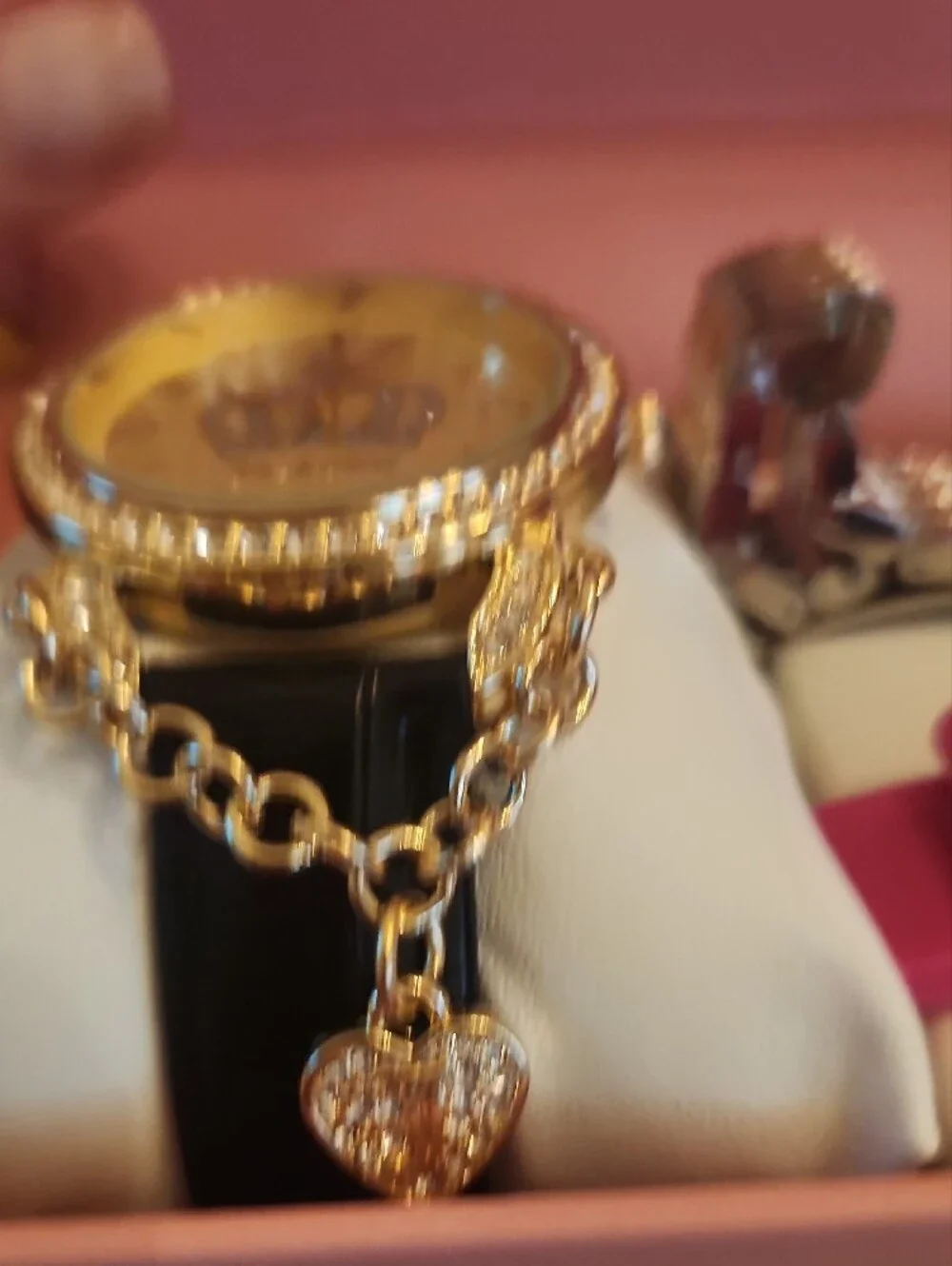 Juicy Couture gold tone